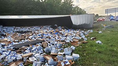 A beer truck overturned, spilling beer cans and foam on the ramp from I-55 to Hwy. 67 in Festus.