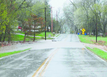 Flash flooding sent water across Hwy. BB in Cedar Hill