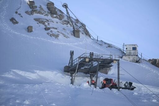 Workers prepare for the demolition operation