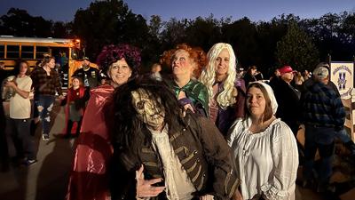 Express Mart group dressed as Hocus Pocus characters at last year's Halloween Parade.