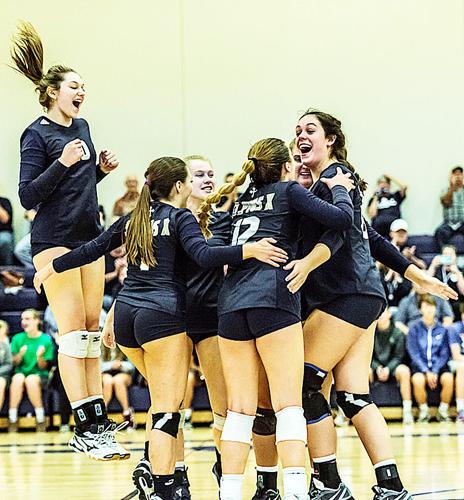 St. Pius volleyball celebration