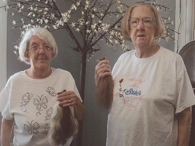 Local sisters donate to Locks of Love