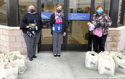 SeaComm donates hats and gloves to Malone Central School District