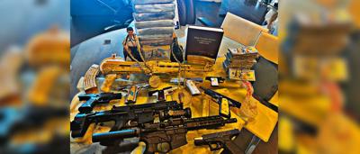 Photo: U.S. Marshals, DEA, Houston police seize large cocaine haul and firearms in Escobar-style drug bust