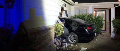 Driver arrested for suspicion of DWI after crashing into house, passing ...
