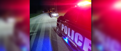Driver arrested for intoxication after near miss with police vehicle ...