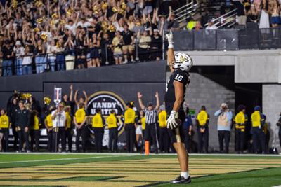 Vanderbilt tight end Cole Spence celebrates touchdown catch