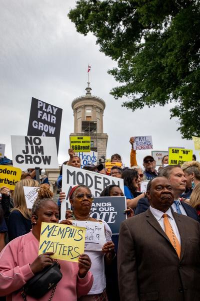 Protesters and elected officials rally outside the state Capitol, May 5, 2026