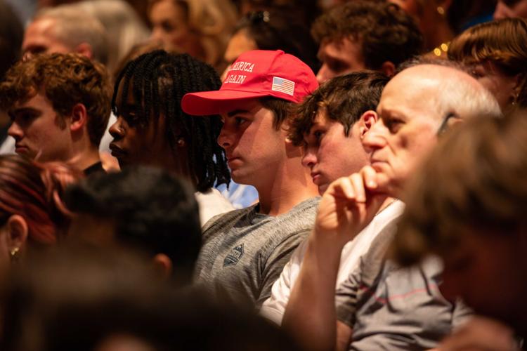 Crowd member wearing MAGA hat at MTSU