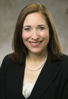 People: Moses names law partner and an associate