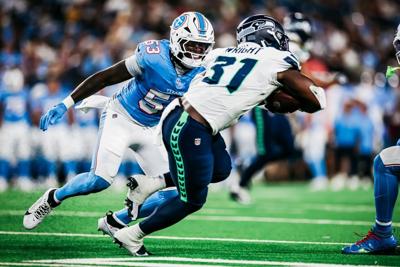Titans linebacker Anthony Hill readies for a tackle