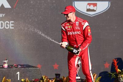 Josef Newgarden celebrates