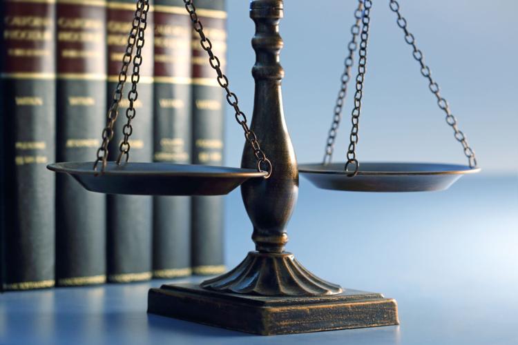 Justice Scale And Row Of  Law Books