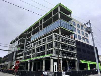 Ernst & Young to create 600 jobs here