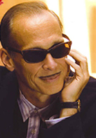 Songwriter sues camp film director John Waters