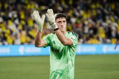 Nashville SC goalie Brian Schwake applauds team's home fans