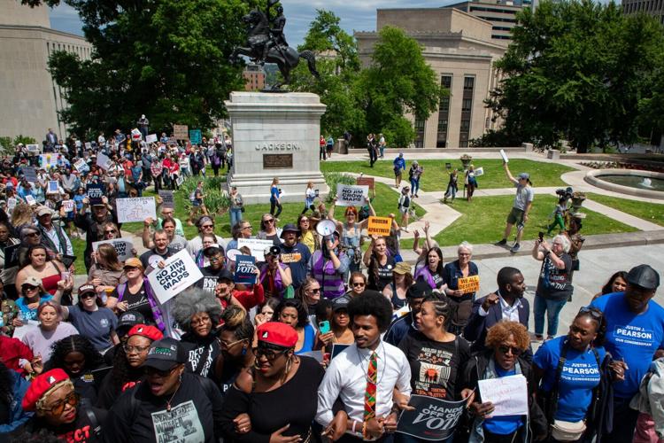 Protesters led by Rep. Justin Pearson march up steps of state Capitol, May 5, 2026