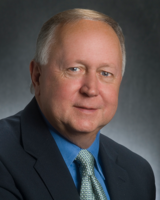 Airport board taps new chair