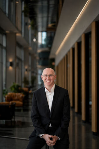 Jonathan Collins, Genesco