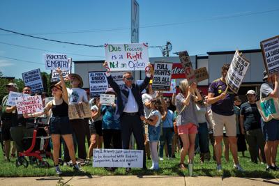 Hundreds gather at the corner of Nolensville Pike and Harding Place on May 17, to protest recent ICE operations in South Nashville
