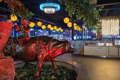 A bull statue in the lobby of Nashville Korean BBQ & Hot Pot