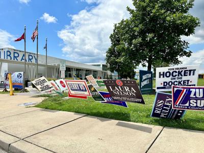Campaign signs outside the Nashville Public Library’s Southeast Branch