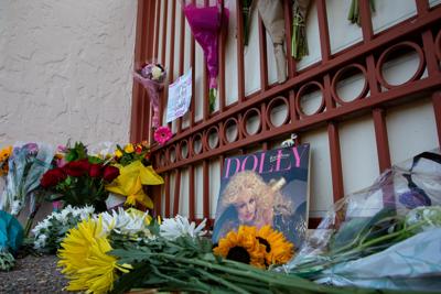 A memorial tribute to Dolly Parton at a property she owned in 12South, photographed shortly after her death was announced on Aug. 25, 2026