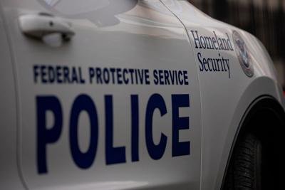 A white Department of Homeland Security vehicle