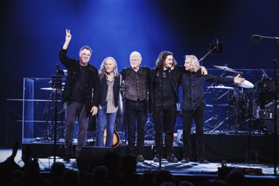 The current touring lineup of the Eagles waves to the crowd in a photo taken at Las Vegas’ Sphere concert venue in 2024.