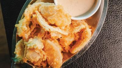 A platter of fried onion petals and sauce from Perfectly Fine, the Nashville Scene’s 2026 Best Fried Thing in Nashville.