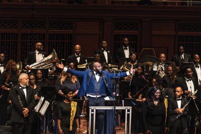 Color photograph of the Nashville African American Wind Symphony performing at a Juneteenth celebration in 2025