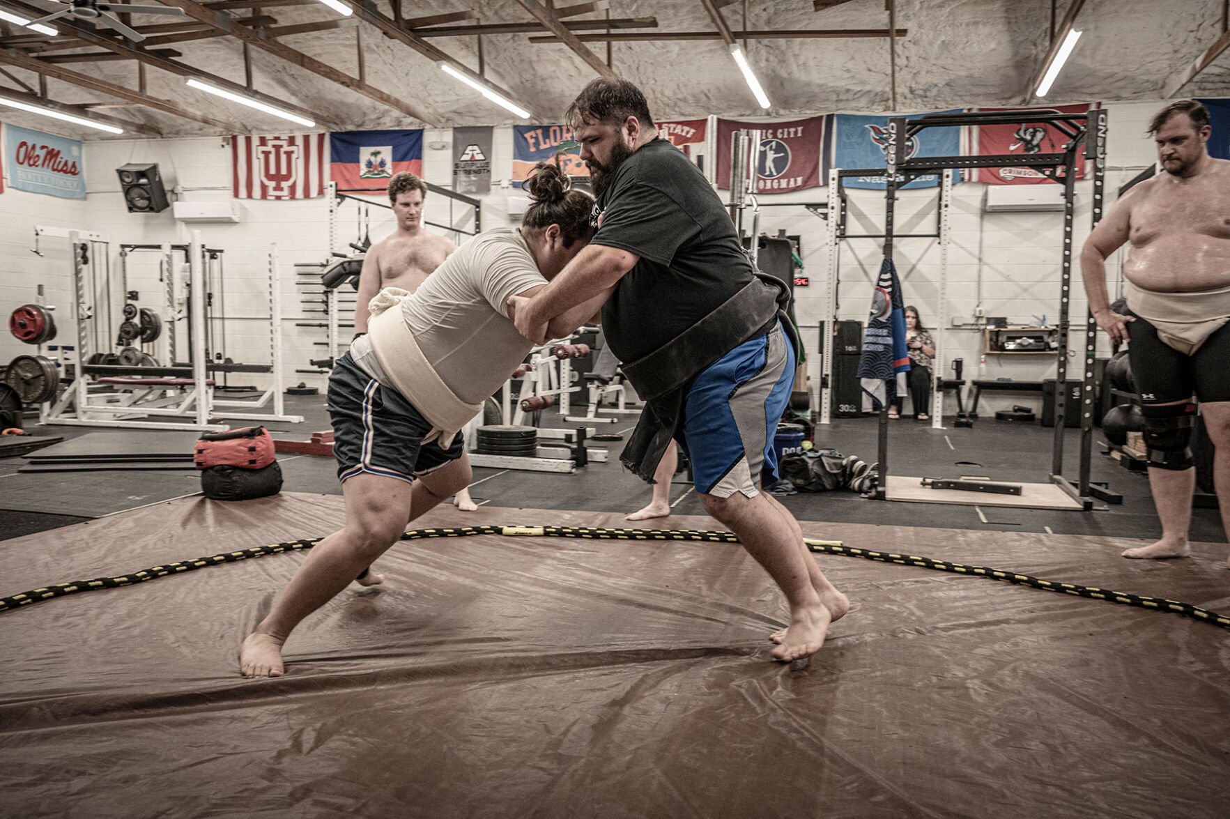 Gabriel Tolentino, left, and Zachary Sparkmen wrestle at Tennessee Sumo Association meeting