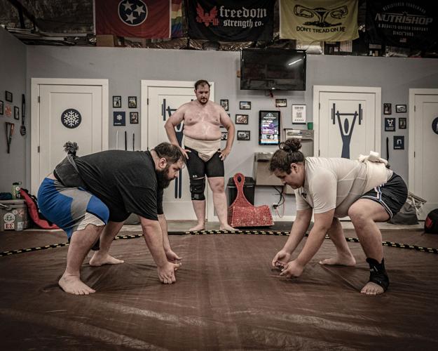 Zachary Sparkman and Gabriel Tolentino prepare to wrestle at Tennessee Sumo Association