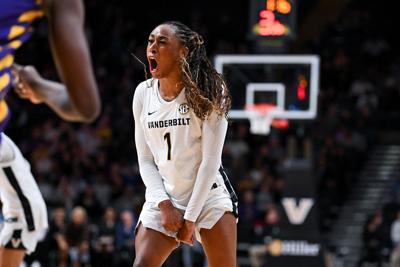 No. 1 Mikayla Blakes celebrates on the court at Memorial Gym