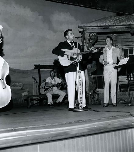 Johnny Cash makes his Opry debut at Ryman Auditorium on July 7, 1956