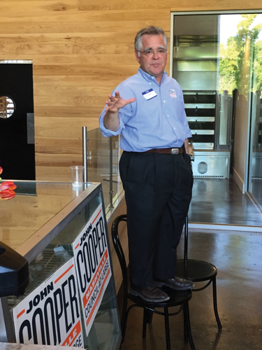 John Cooper, brother of Jim, takes a wonky, optimistic swing at a council-at-large seat