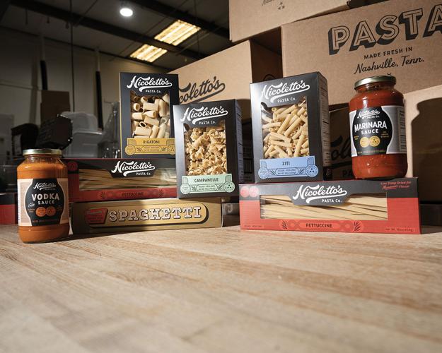 A jar of vodka sauce, boxes of pasta like spaghetti and rigatoni, and a jar of marina sauce all from Nicoletto's