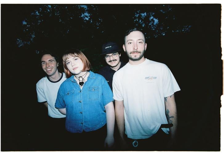 Sewing Club press photo flash photo of the band in the woods in the dark
