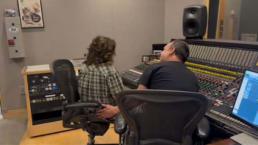 April McLean and Todd Moore in the studio, listening to playback