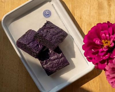 Three dark purple brownies on a pan from KFAM Sweets, the Nashville Scene’s 2026 Best Brownies in Nashville.