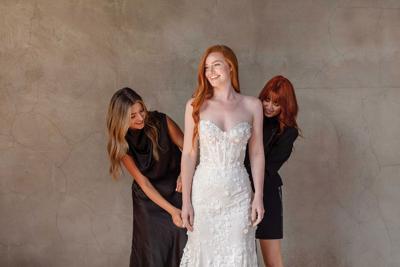 women help fit a client in a wedding dress at Adorn Bridal, the Nashville Scene’s 2026 Best Bridal Boutique in Nashville