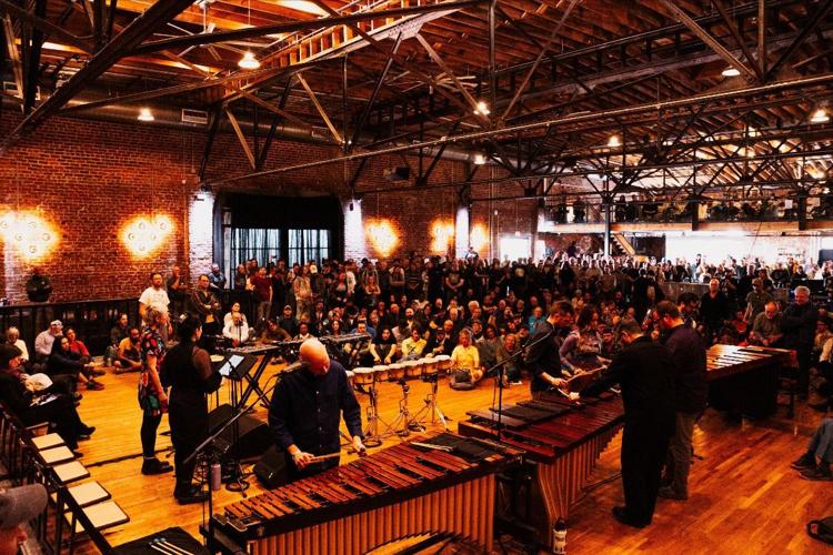 Color photograph of a live performance on multiple marimbas during Big Ears