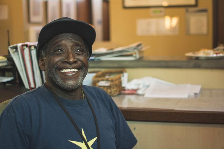 Melvin Scates-at-Guest-House-desk.jpg