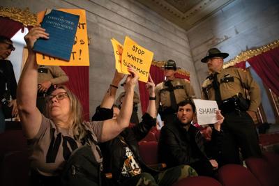 Protesters in the House gallery, May 7, 2026