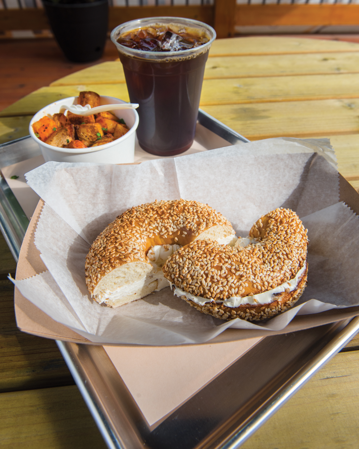 Cheap Eats: Bare Naked Bagel — Bagel With Cream Cheese and Side of Skillet Potatoes — $6.75