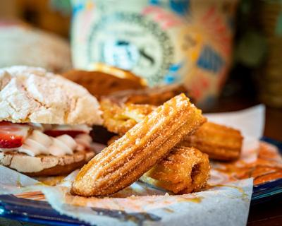 sugar dusted churros on wax paper at JOS Fifteen, the Nashville Scene’s 2026 Best Churro in Nashville