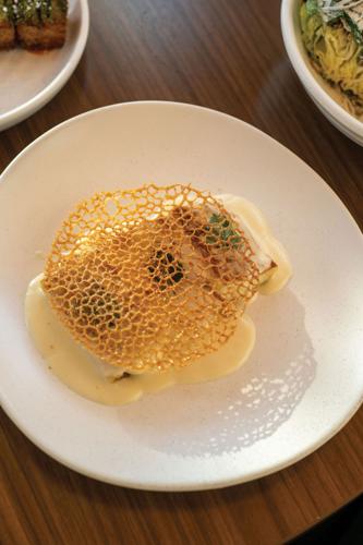 Scallop-stuffed crêpe with nam prik blanquette and lace tuile at Bad Idea
