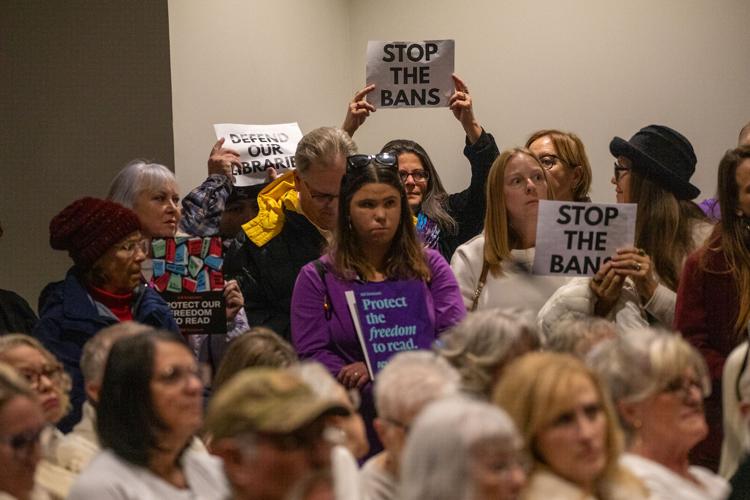 Protesters during a Rutherford County Library System board meeting in Murfreesboro