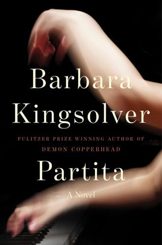 Cover illustration of Barbara Kingsolver's 'Partita,' featuring a long-exposure blurry photograph of hands dramatically playing a piano.