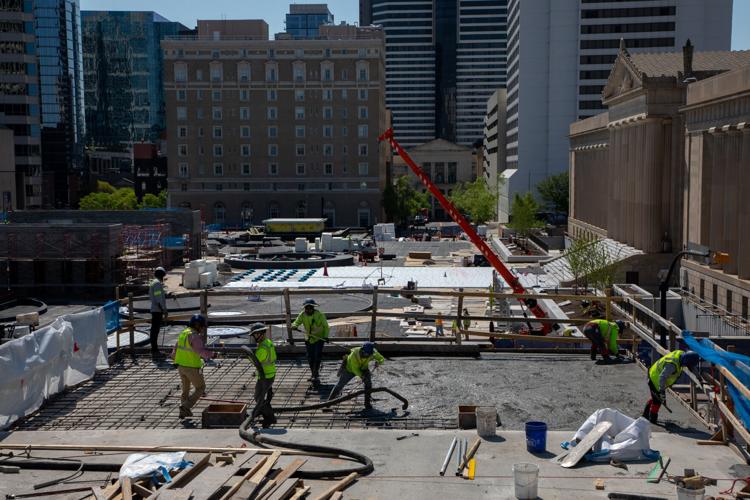 Construction workers pour concrete during a months-long renovation project ast the state Capitol and Legislative Plaza, April 9, 2026